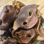 Bark Road Pork Snouts dog treats showing the size and texture of the pieces